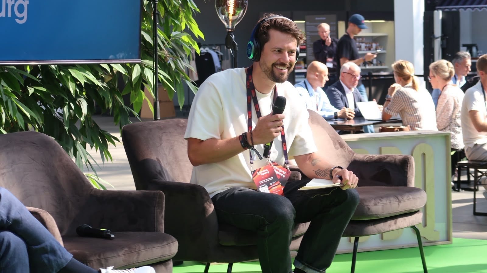 Adrian Swartz moderating a conversation at TechBBQ Copenhagen
